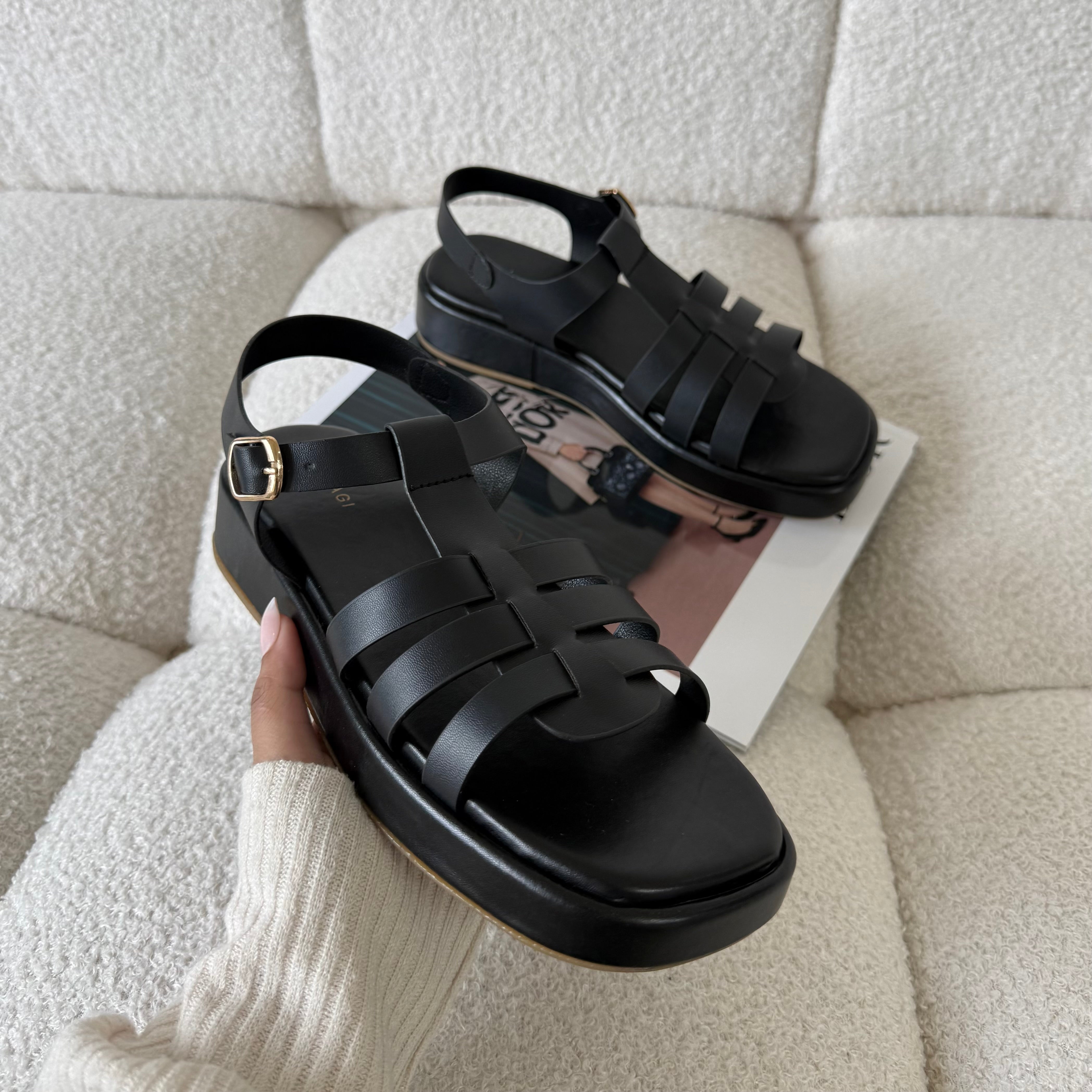 Black fisherman sandals