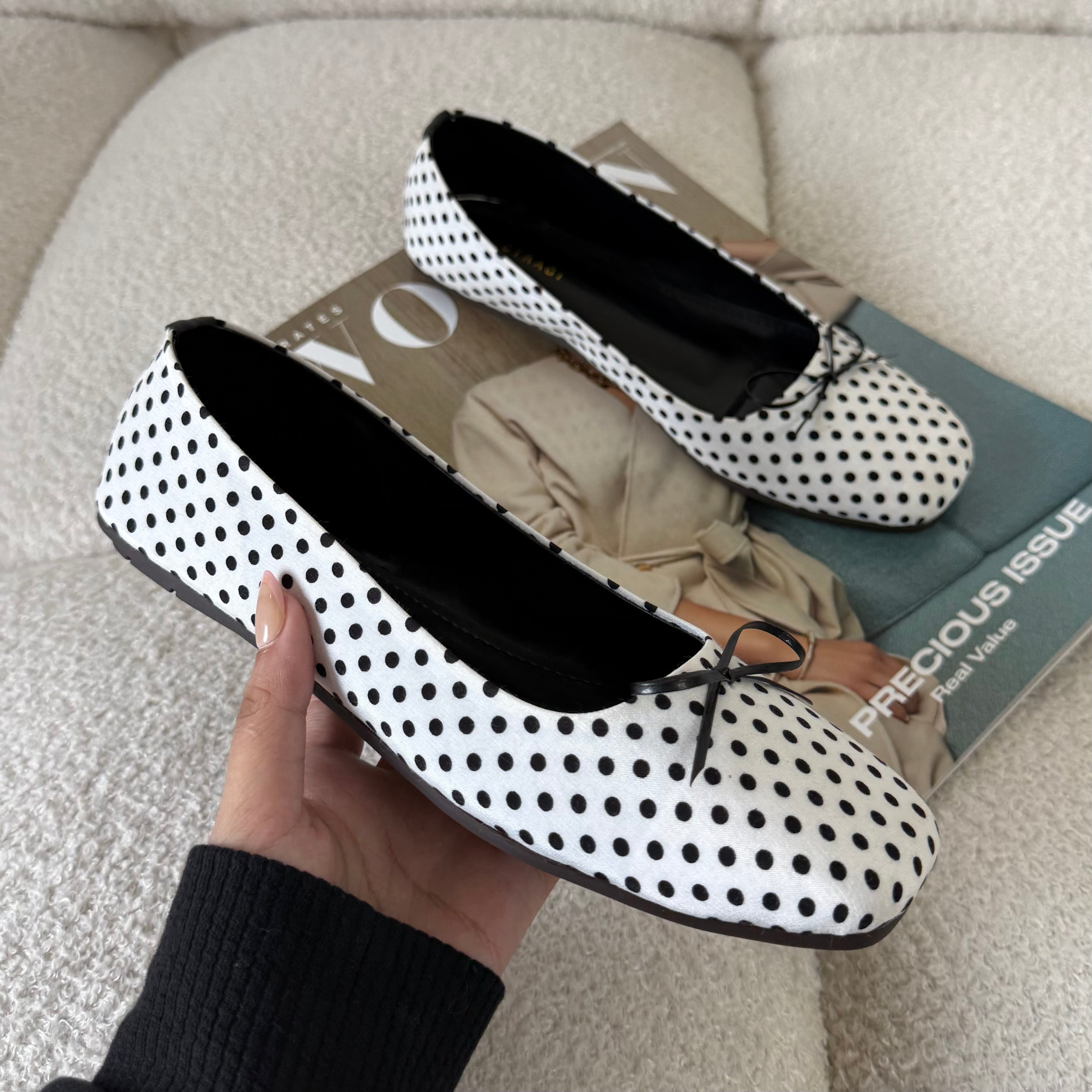 White polka flats