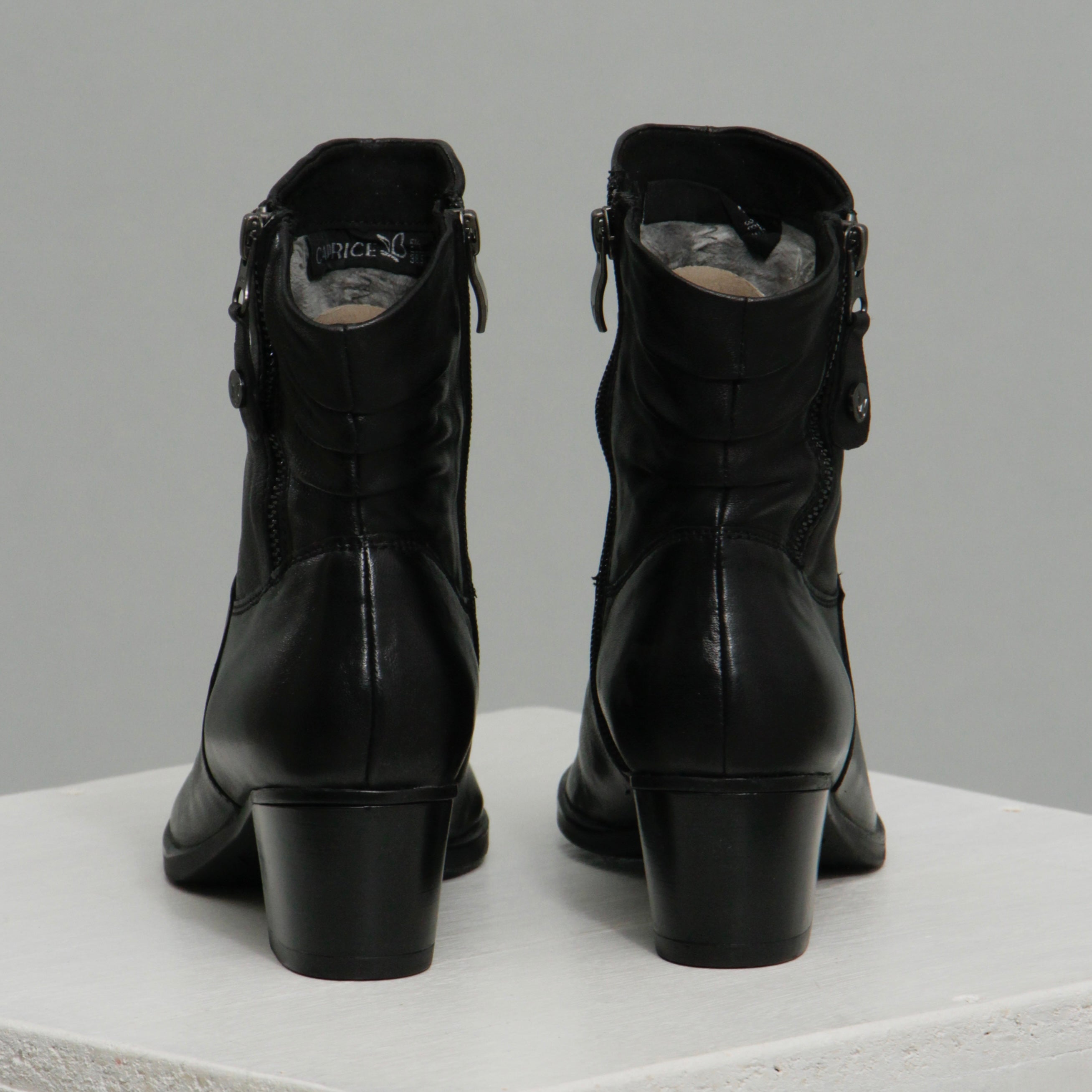 Zipper heeled crease fold boots