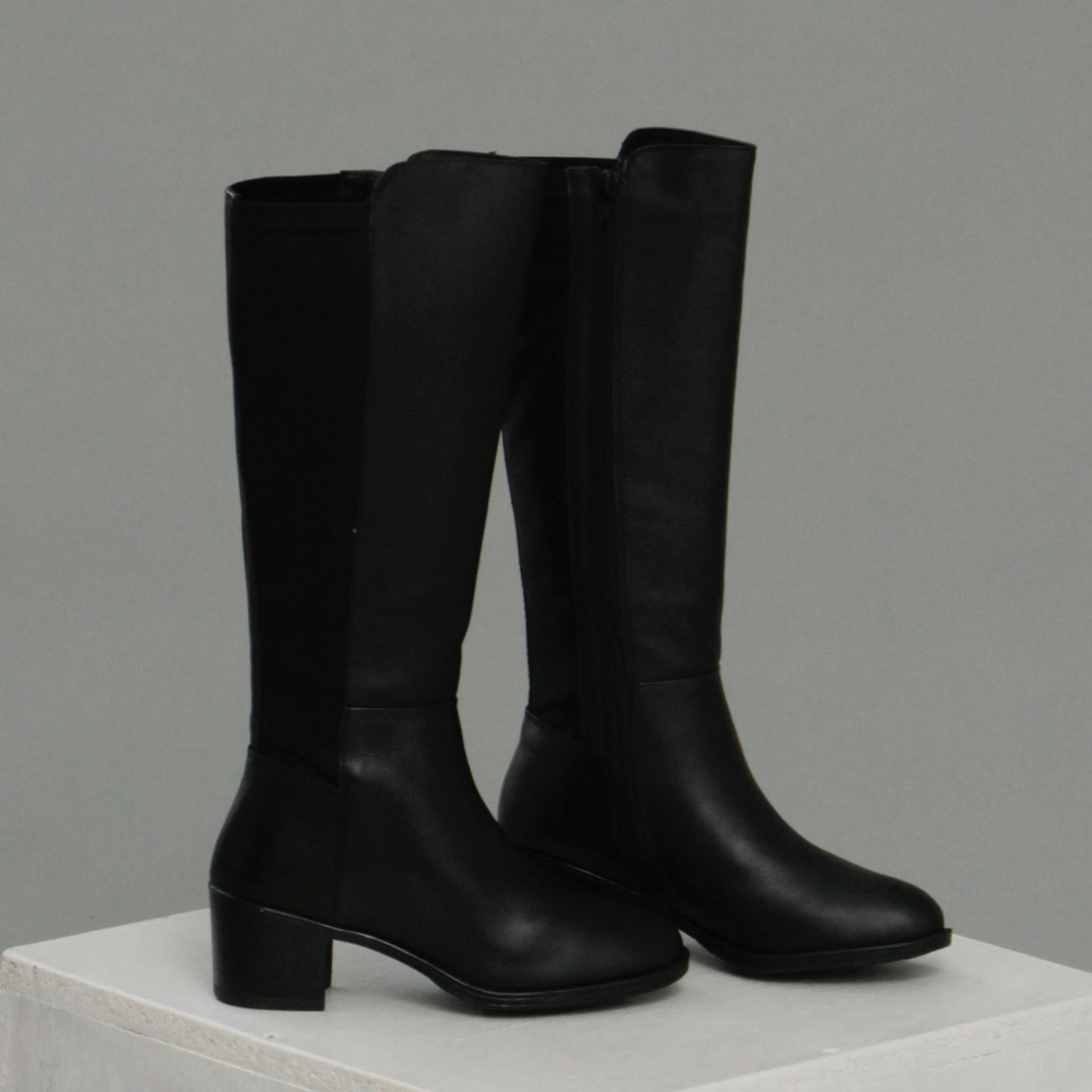 Jet black tall boots