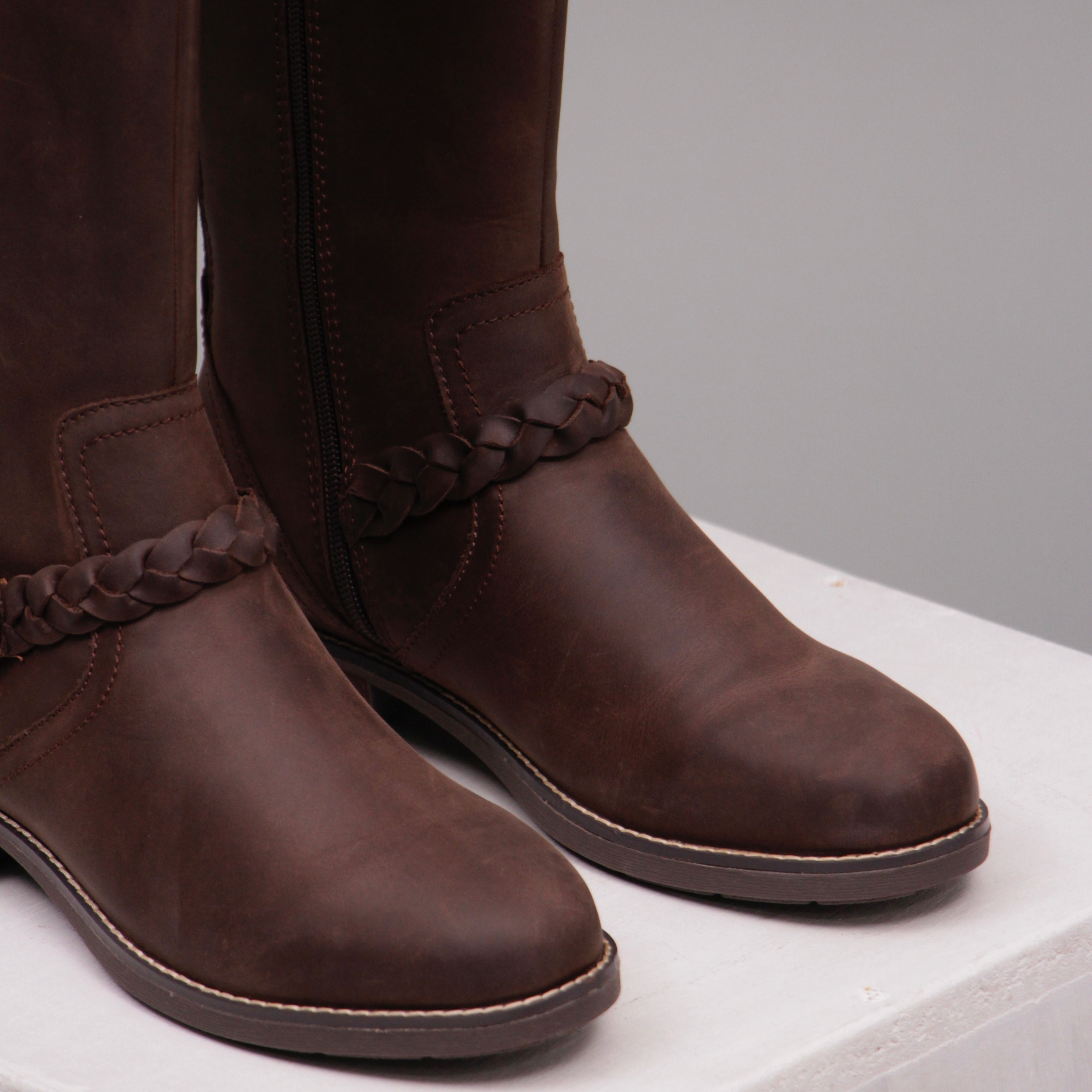 Long brown horse riding boots