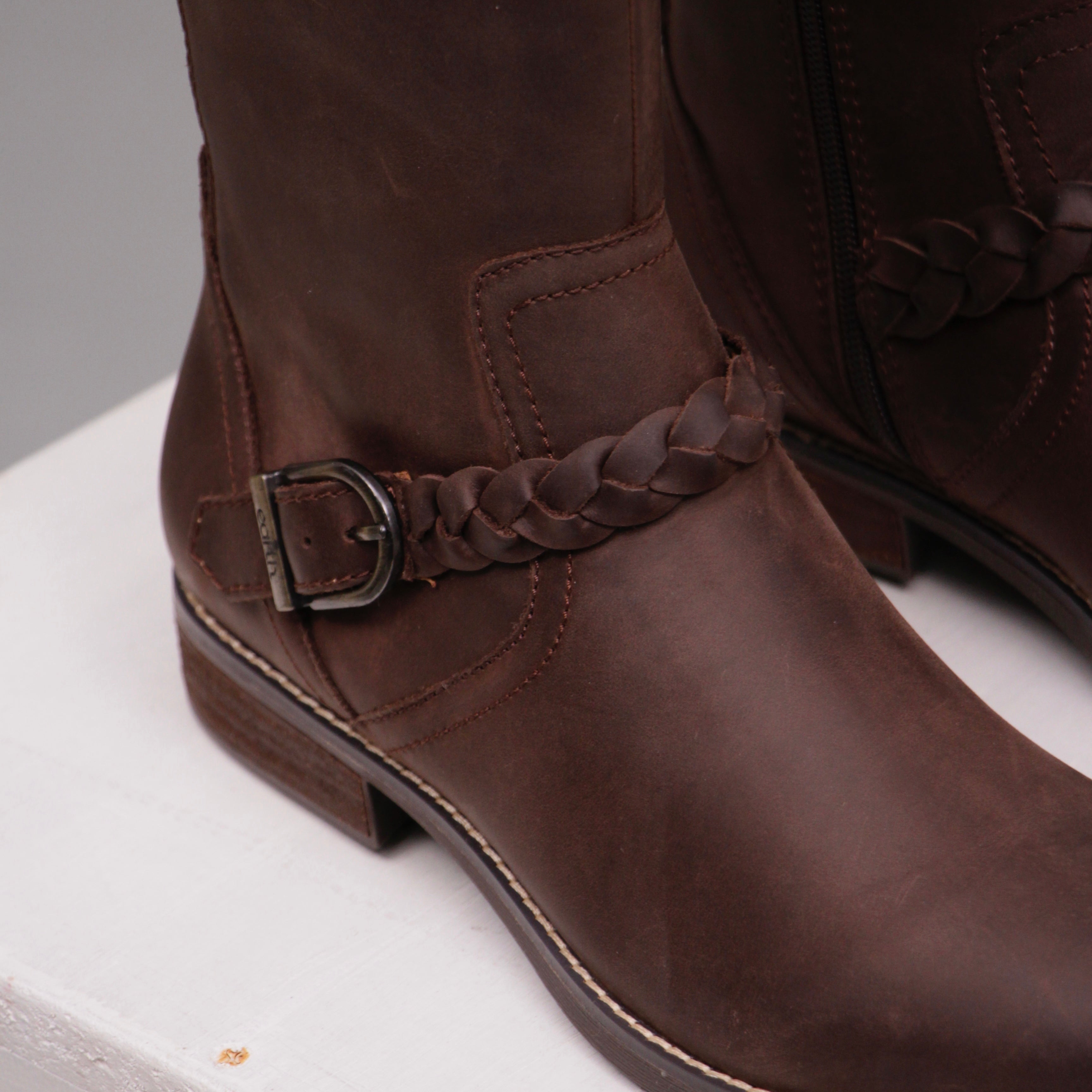 Long brown horse riding boots