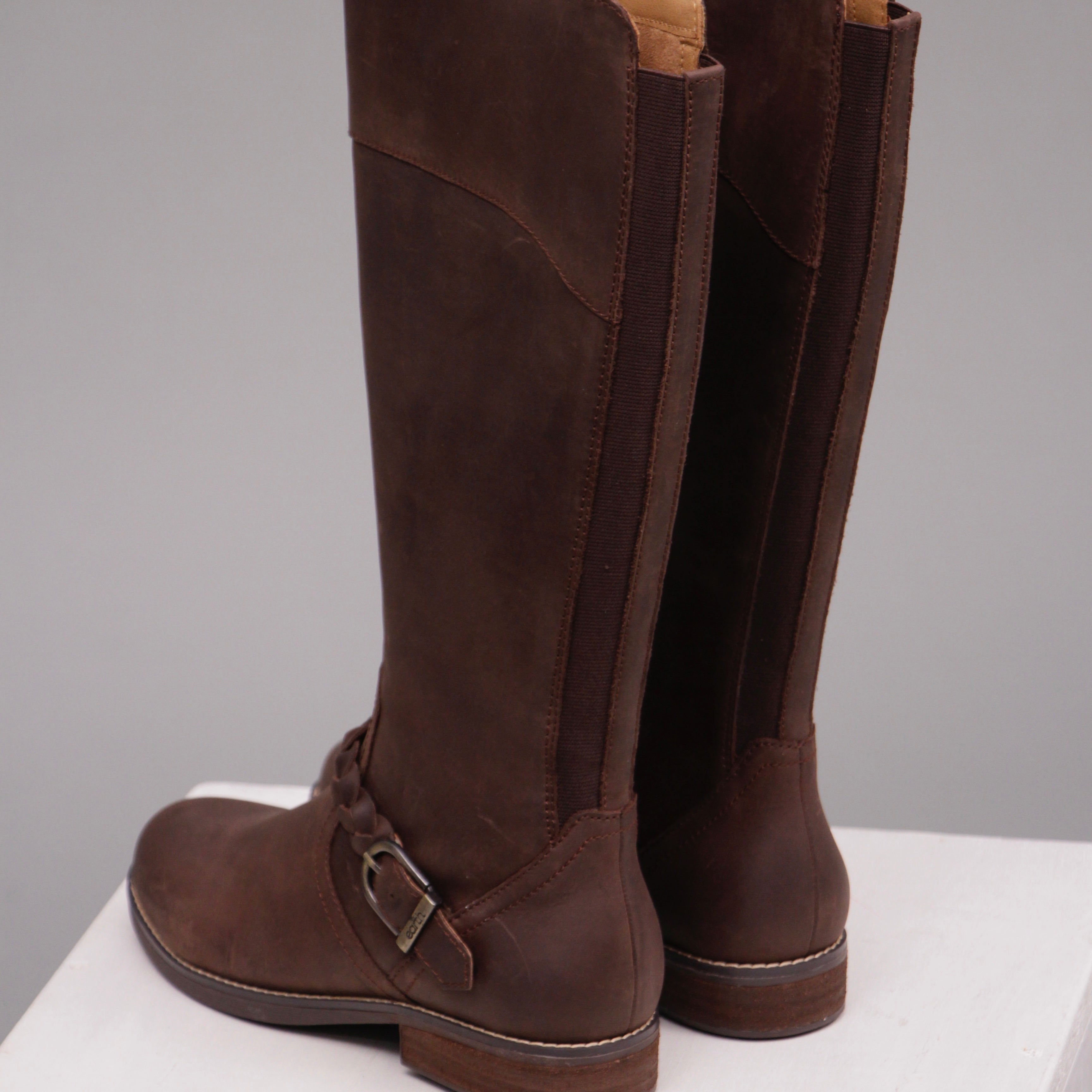 Long brown horse riding boots