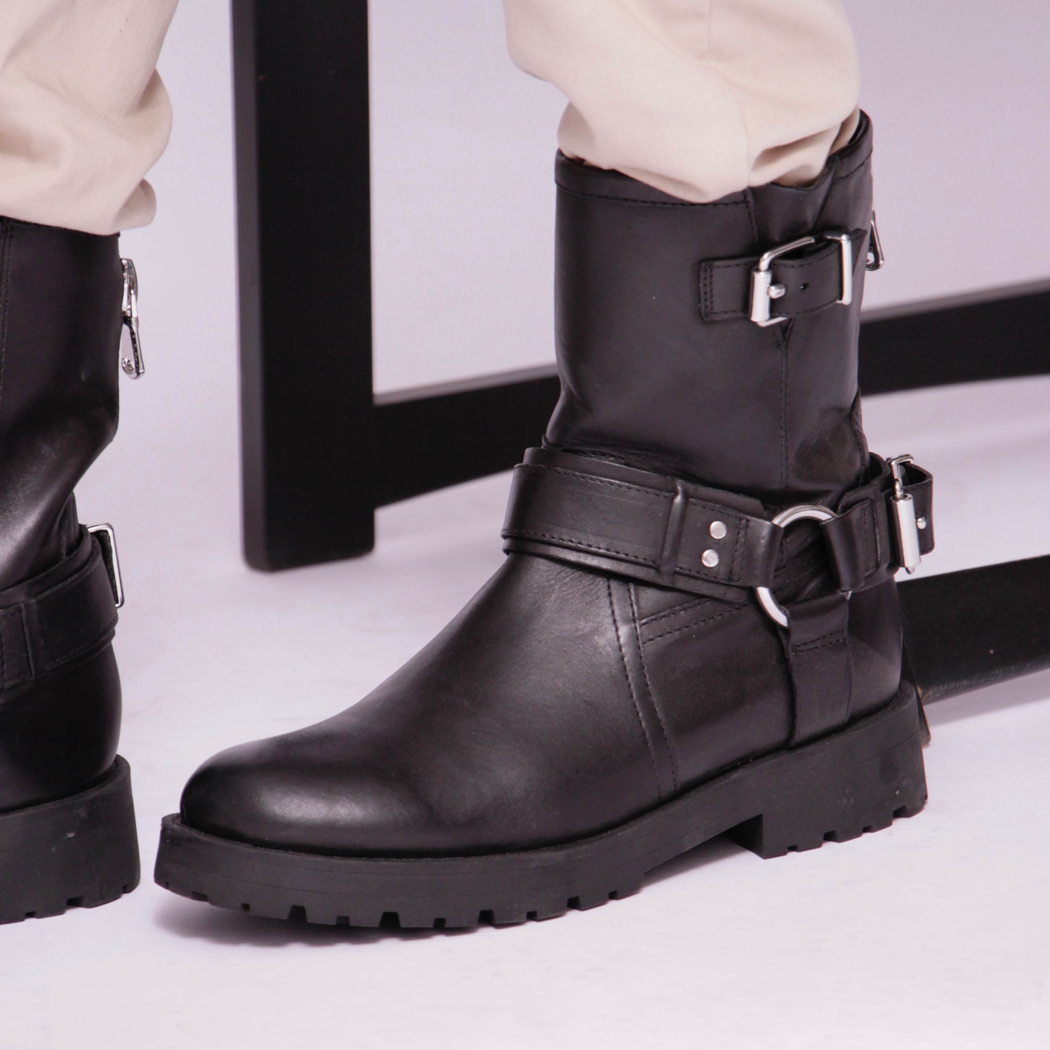 Ankle high buckle boots