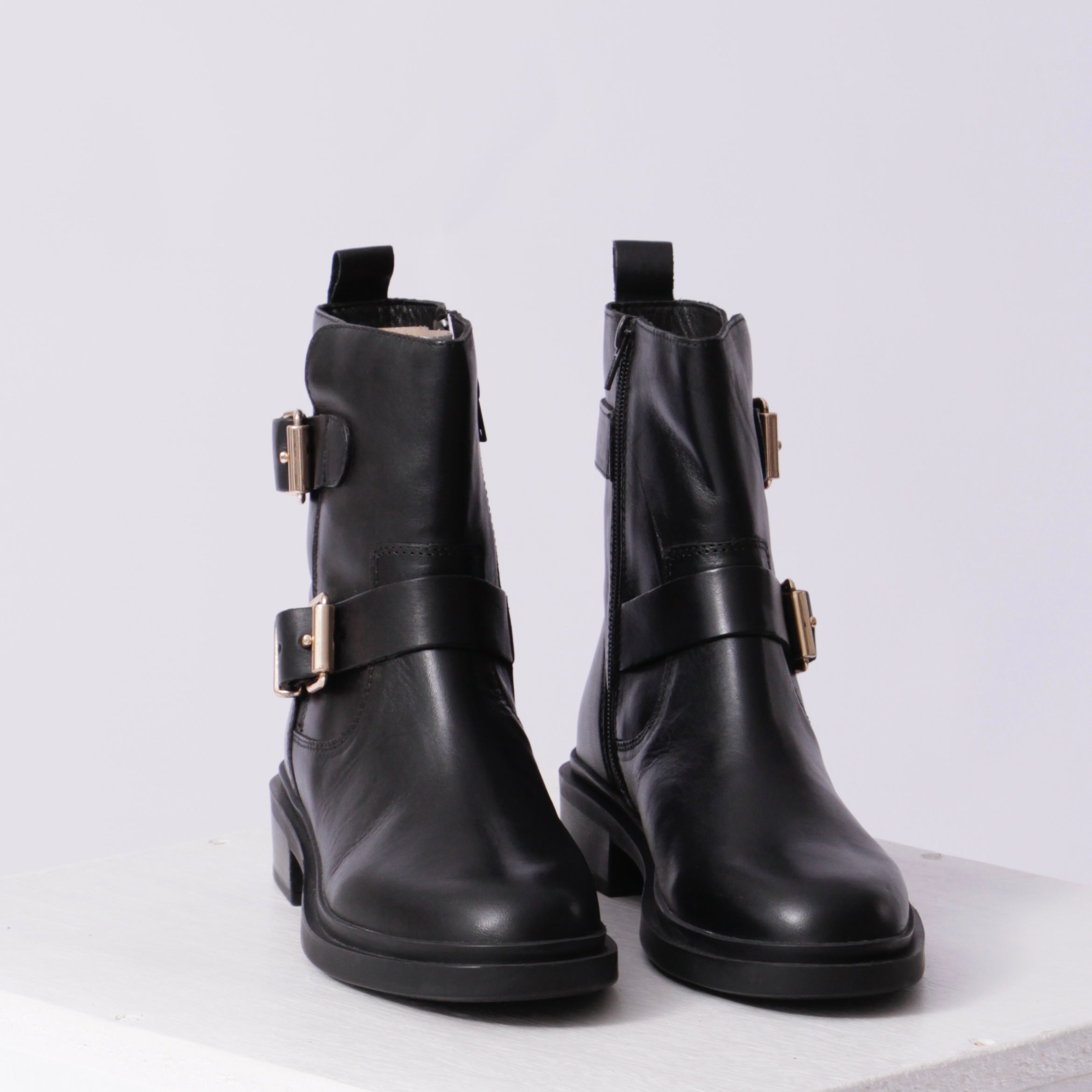 Sleek buckle boots