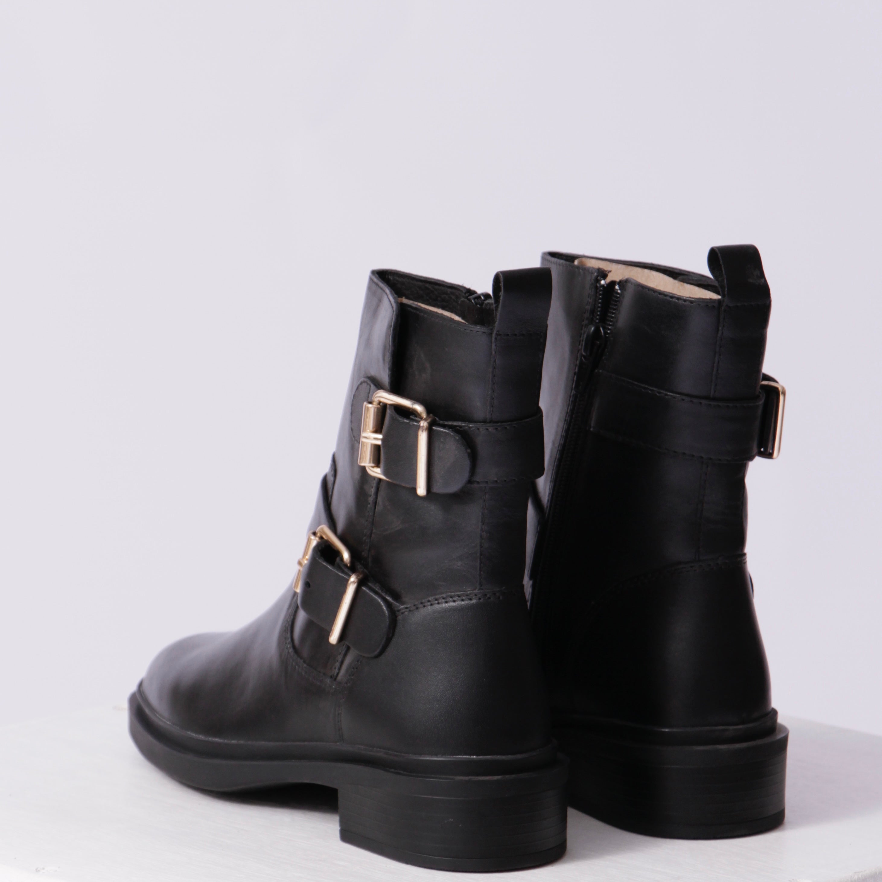 Sleek buckle boots