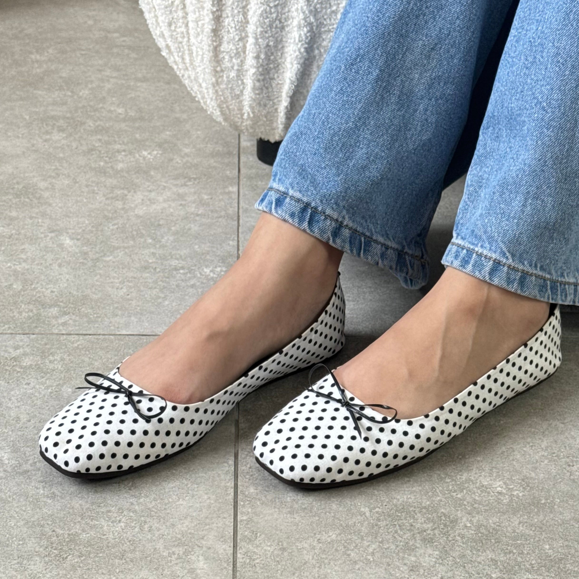 White polka flats